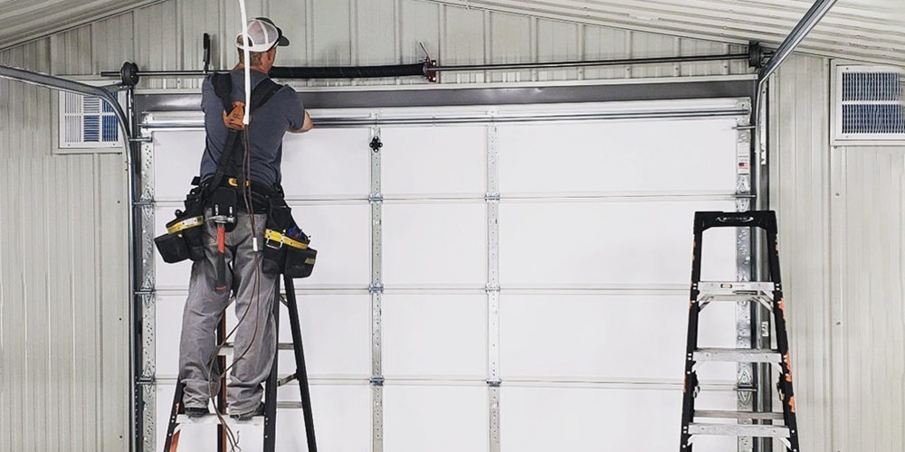 Garage door repair specialist at work