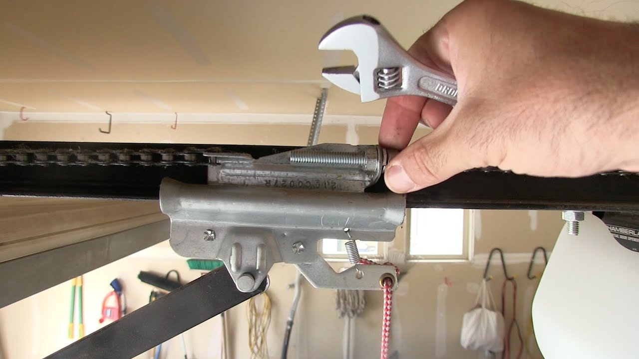 Inspecting a garage door for repair needs